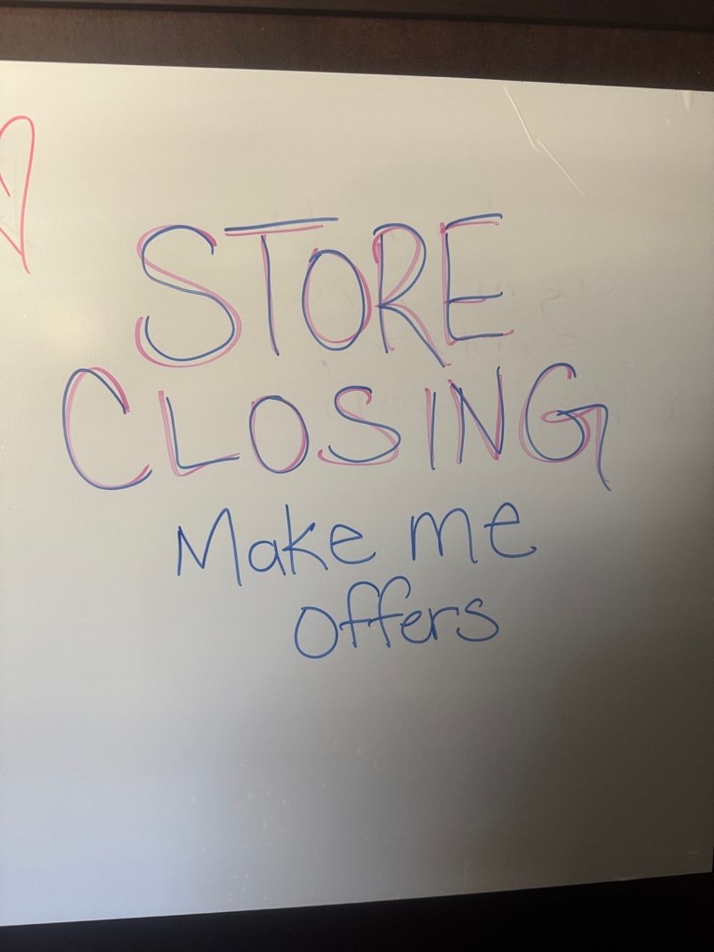 Whiteboard with Multicolor Marker Writing - "Store Closing"
